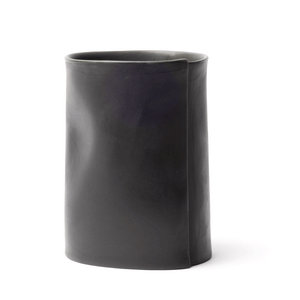 Black tall cup made by OXUM NYC, part of the handmade ceramic home accessories collection. The mug has a total of 16 oz capacity for any liquid.